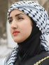 beatiful woman wearing Palestinian keffiyeh scarf showcasing classic authentic palestine patterns, symbolizing palestinian cultural heritage and resistance arab headscarf for men and women