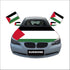 Car decorated with Palestine car hood cover, matching mirror covers, and window flags displaying Palestinian pride